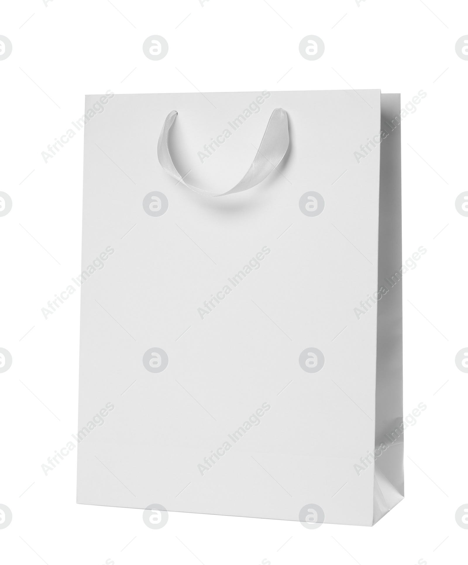 Photo of Paper shopping bag isolated on white. Mock up for design