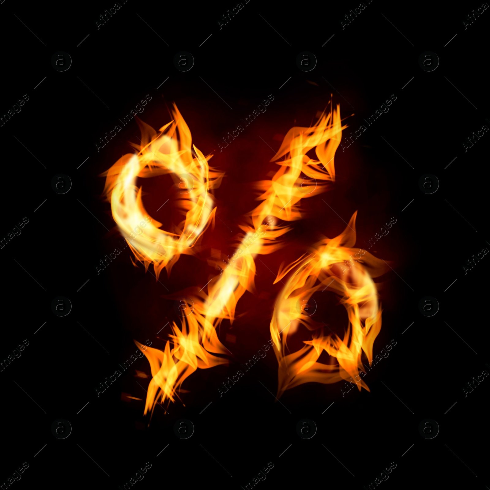 Image of Bright flaming percent symbol on black background