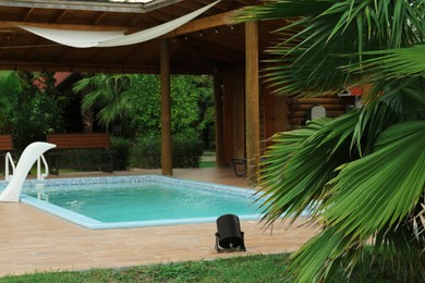 Outdoor swimming pool with clear water at resort