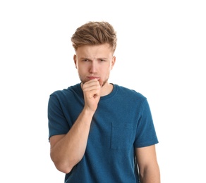 Photo of Handsome young man coughing against white background