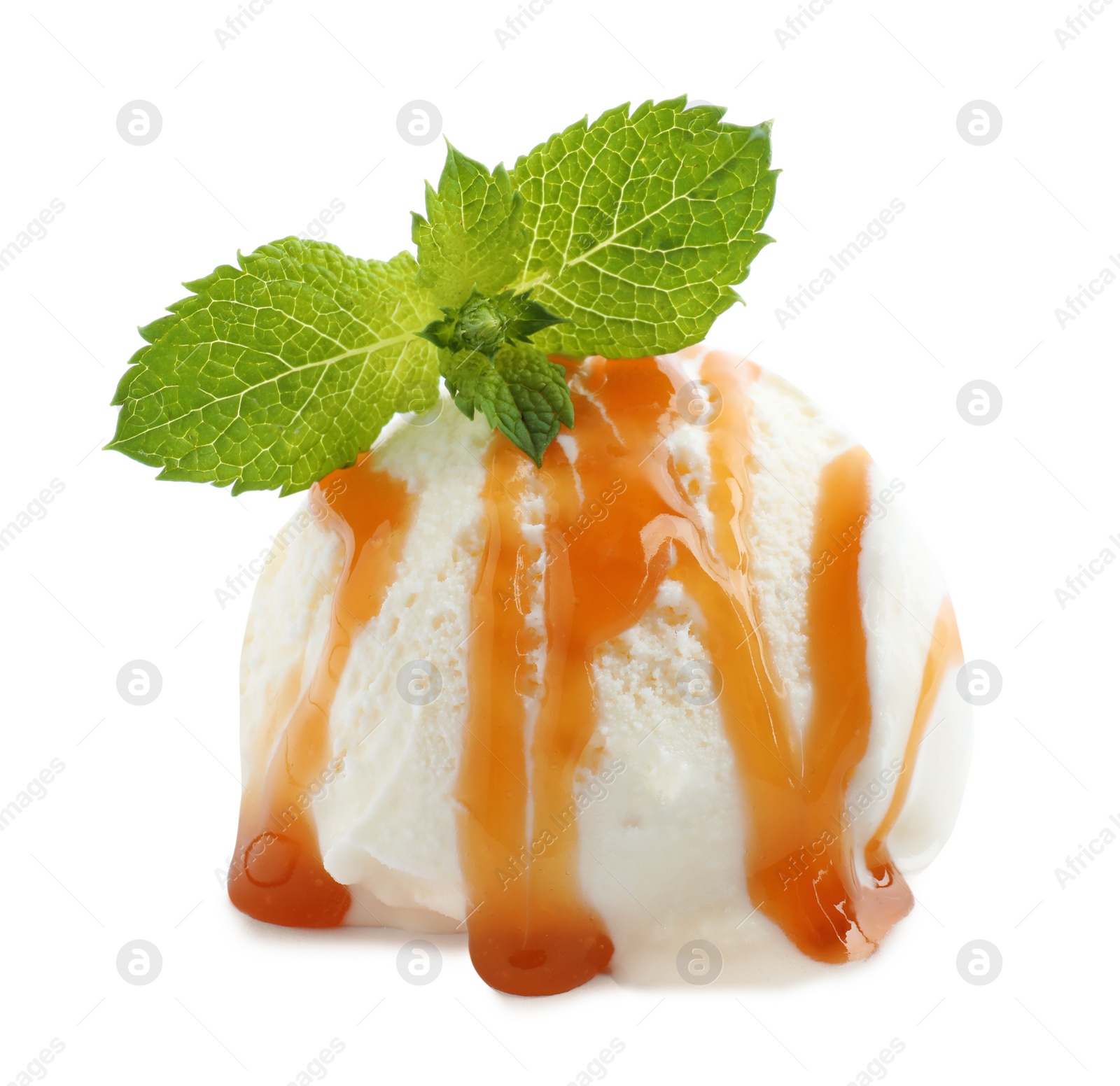 Photo of Scoop of delicious ice cream with caramel sauce and mint on white background