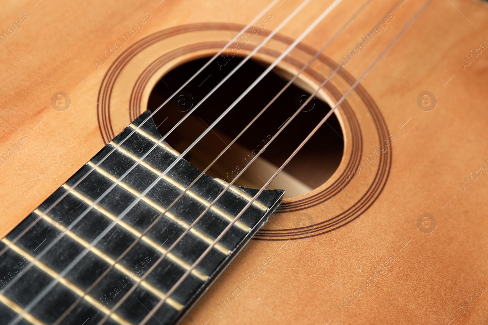 Photo of Beautiful classical guitar, closeup view. Musical instrument