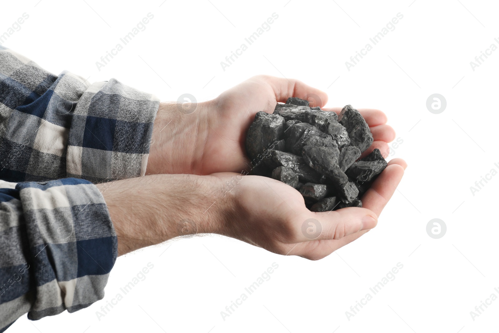 Photo of Man holding coal in hands on white background, closeup
