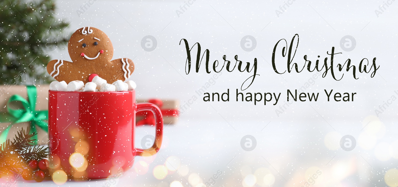 Image of Merry Christmas and Happy New Year. Gingerbread man in red cup with marshmallows on white table, banner design