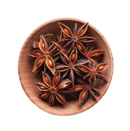 Photo of Aromatic anise stars in wooden bowl isolated on white, top view