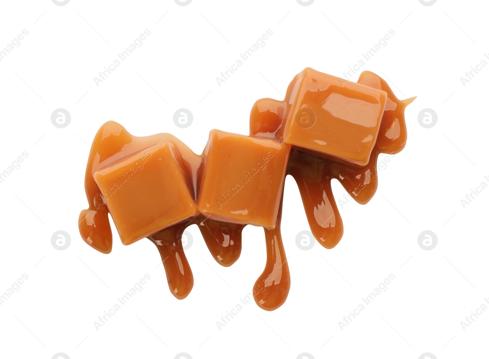 Photo of Caramel candies with topping on white background, top view