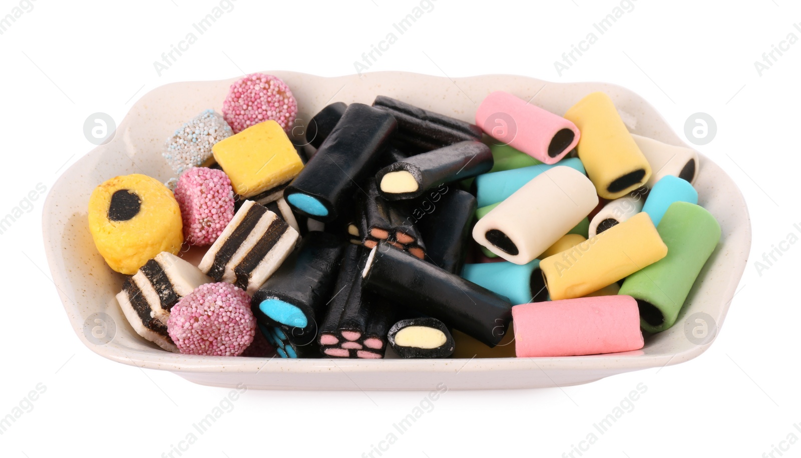 Photo of Tray with many tasty liquorice candies isolated on white