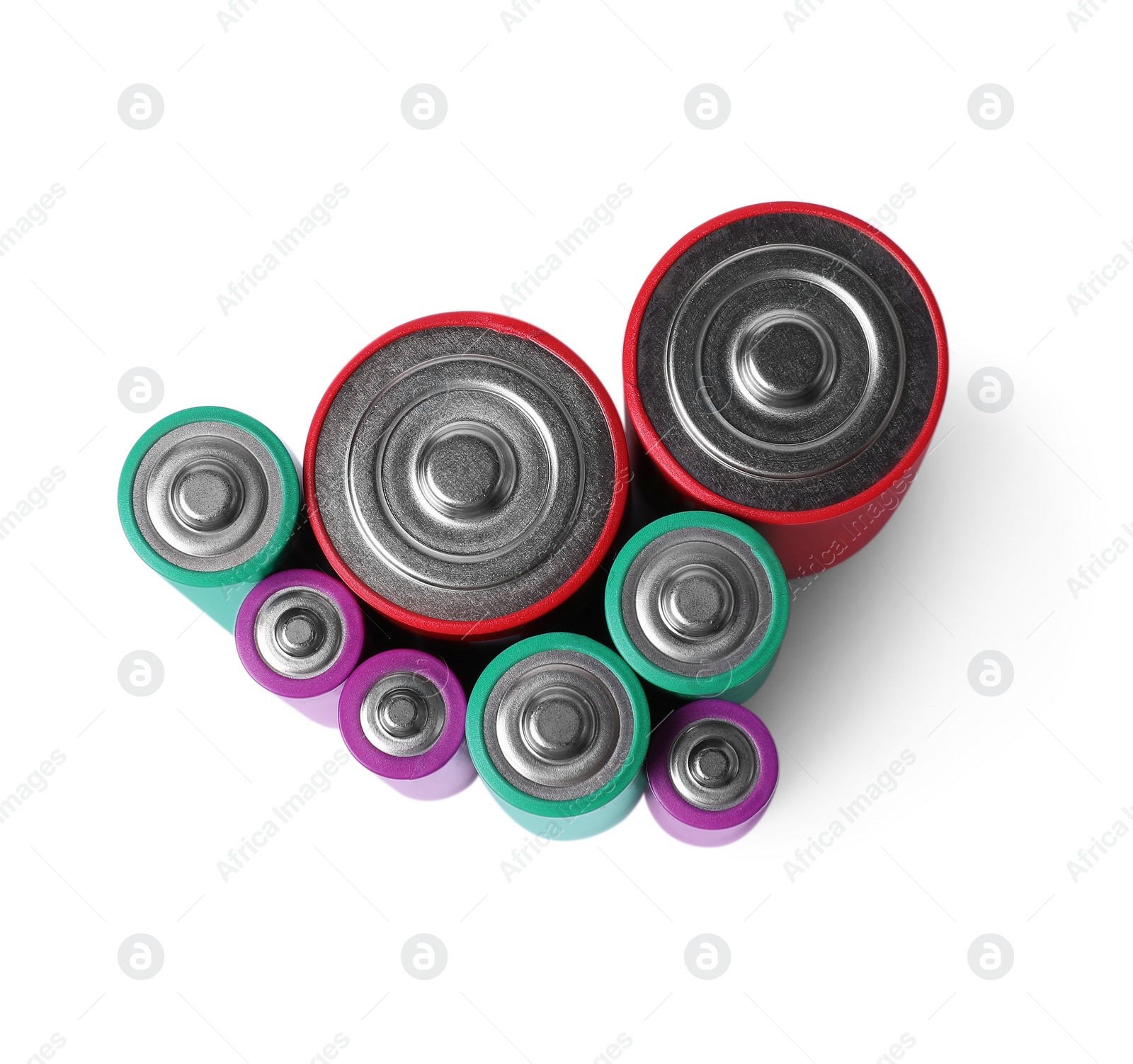 Photo of Many different new batteries isolated on white, top view