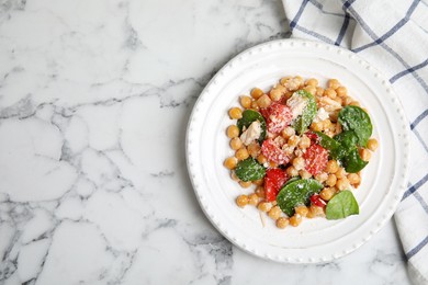 Photo of Delicious fresh chickpea salad on white marble table, flat lay. Space for text