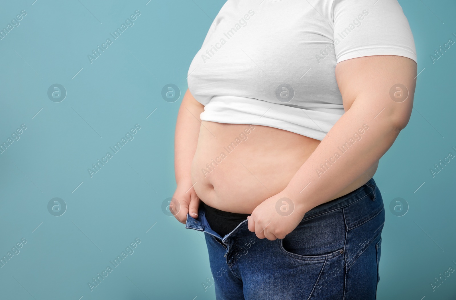 Photo of Overweight woman on color background