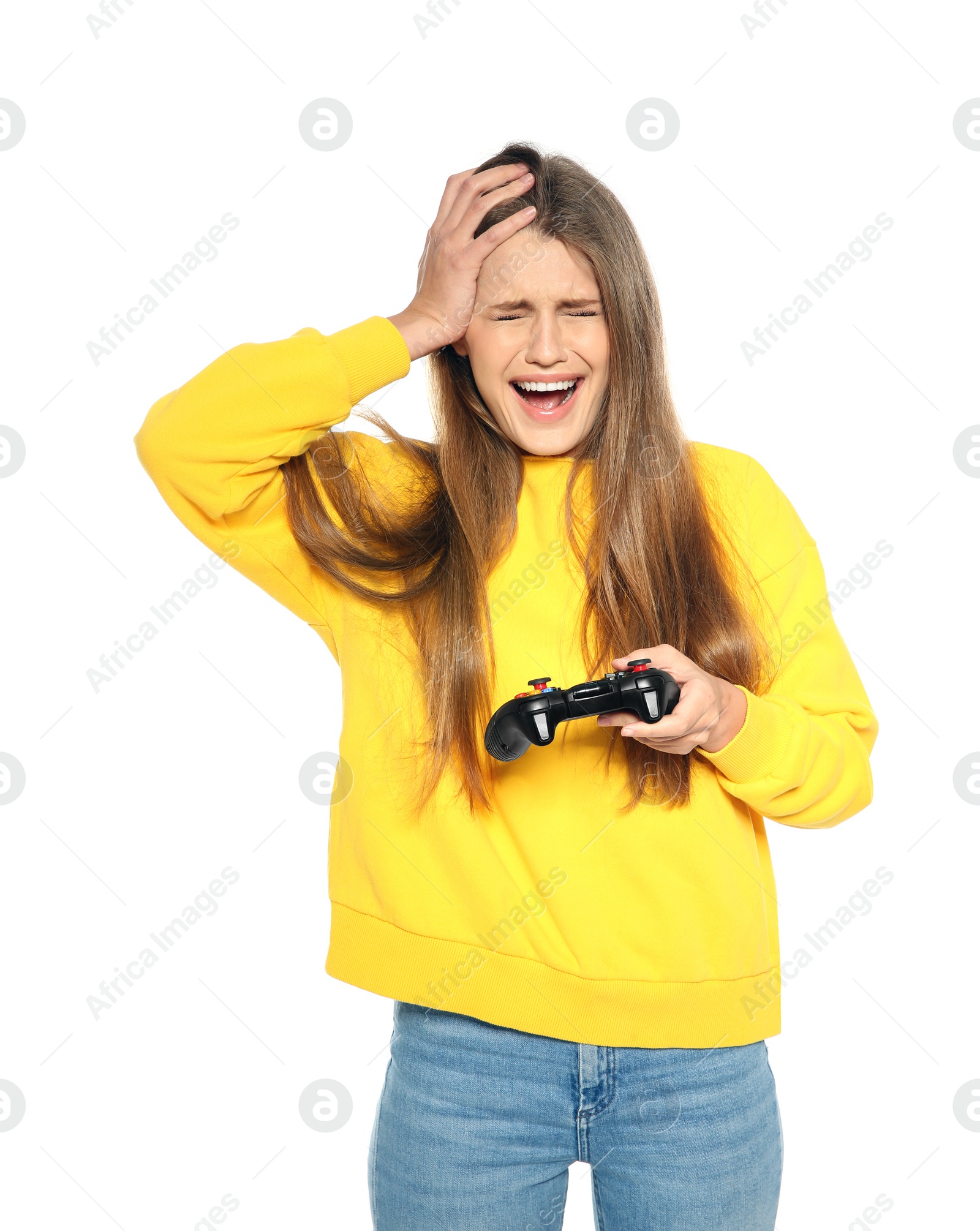 Photo of Emotional young woman playing video games with controller isolated on white