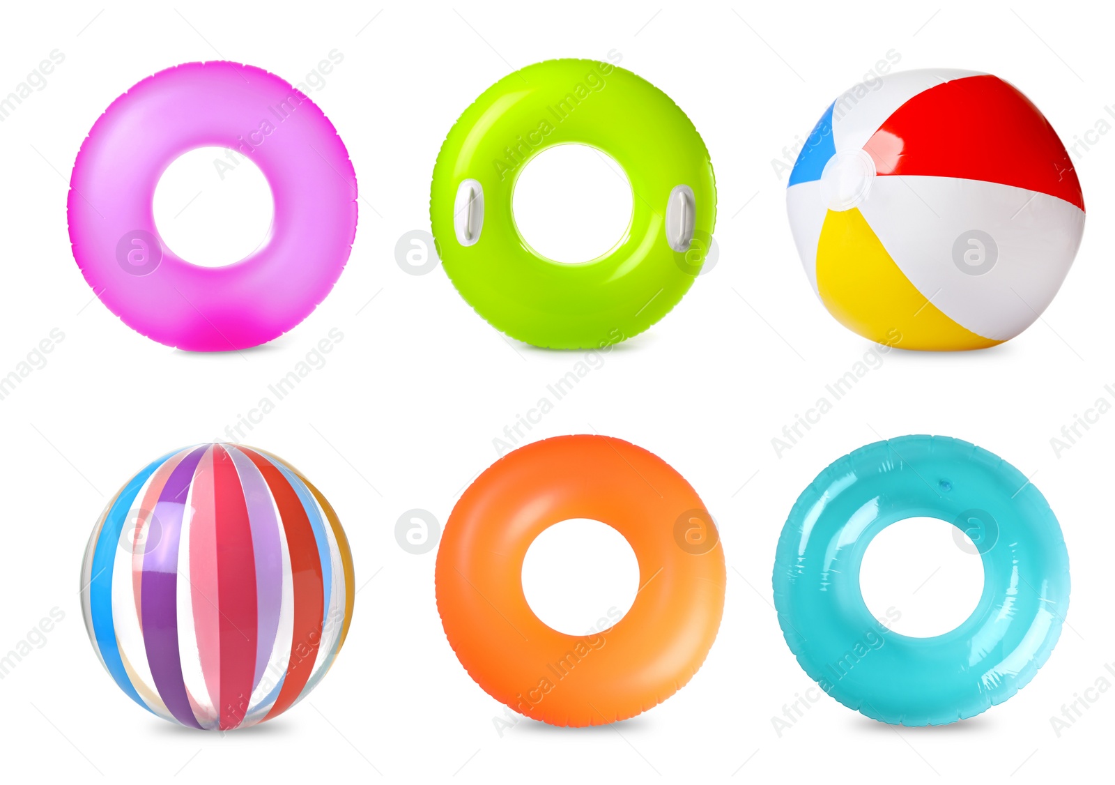 Image of Set with colorful inflatable rings and balls on white background 