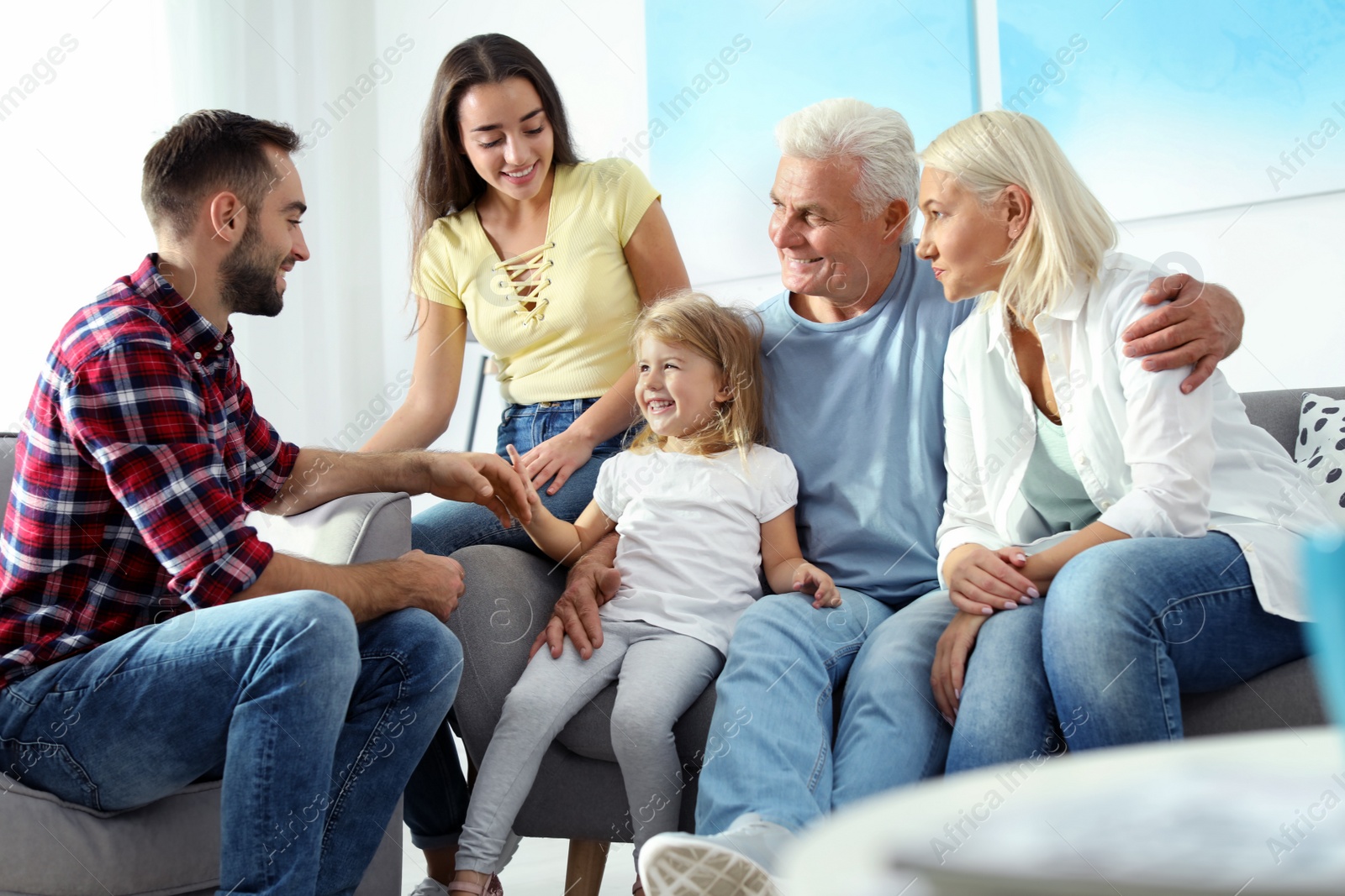 Photo of Happy family at home. Reunion of generations