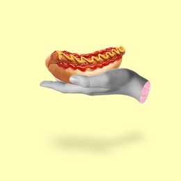 Image of Woman holding hot dog in hand on color background. Creative art design