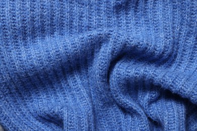 Texture of soft blue fabric as background, top view