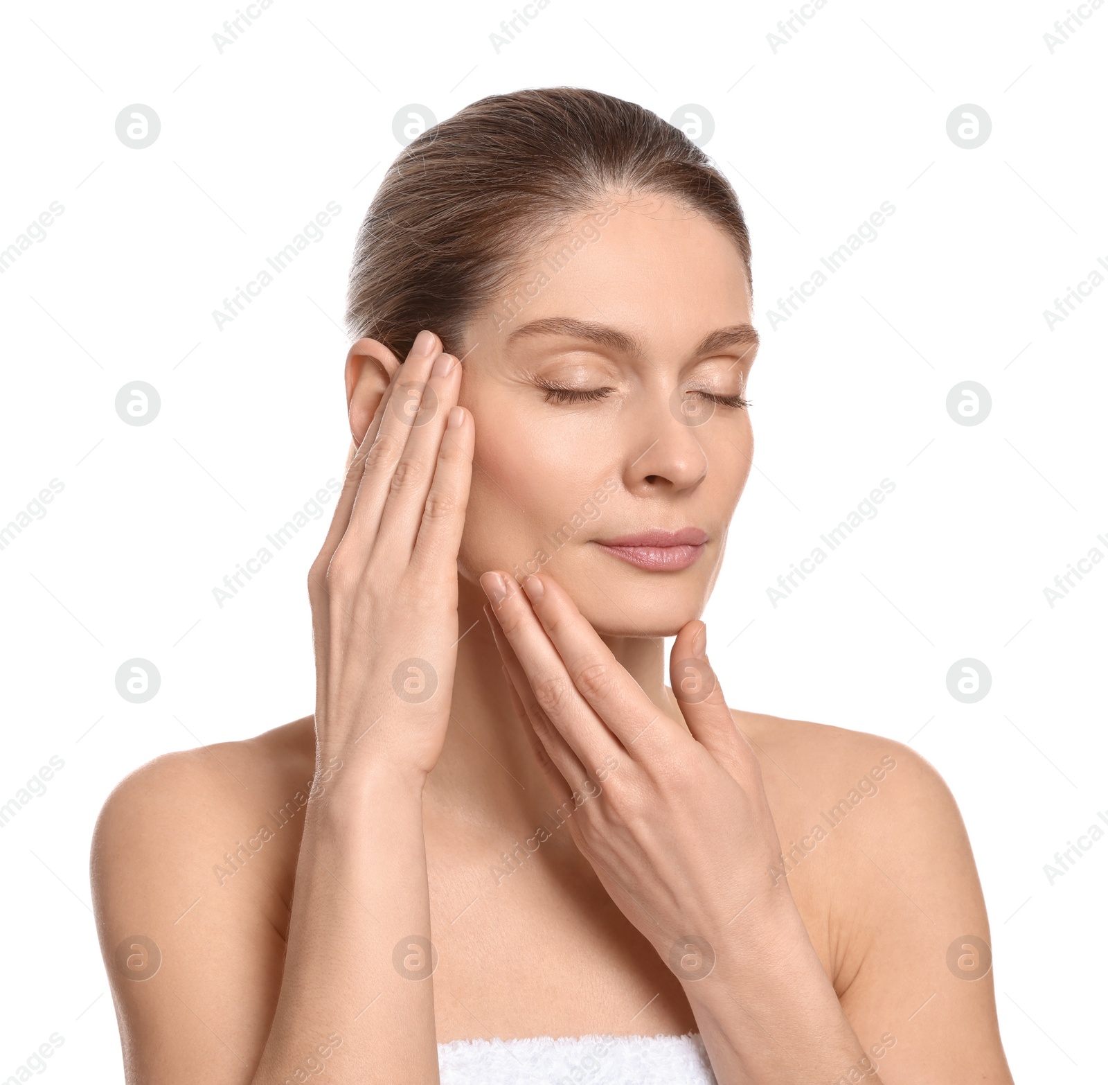 Photo of Woman massaging her face on white background