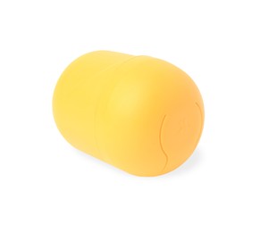 Photo of Slynchev Bryag, Bulgaria - May 23, 2023: One yellow plastic capsule from Kinder Surprise Egg isolated on white