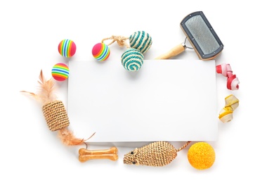 Photo of Composition with blank sheet of paper and cat's accessories on white background