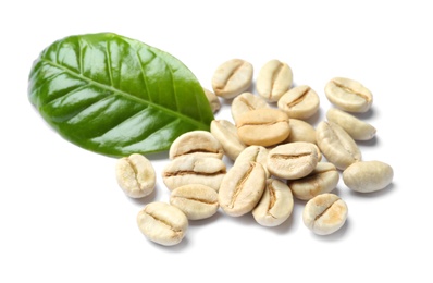 Photo of Green coffee beans and fresh leaf on white background