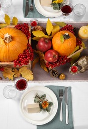 Photo of Beautiful autumn place setting and decor on table, flat lay
