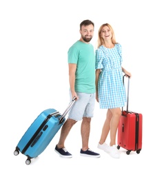 Photo of Couple with suitcases on white background. Vacation travel