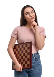 Photo of Thoughtful woman with chessboard on white background