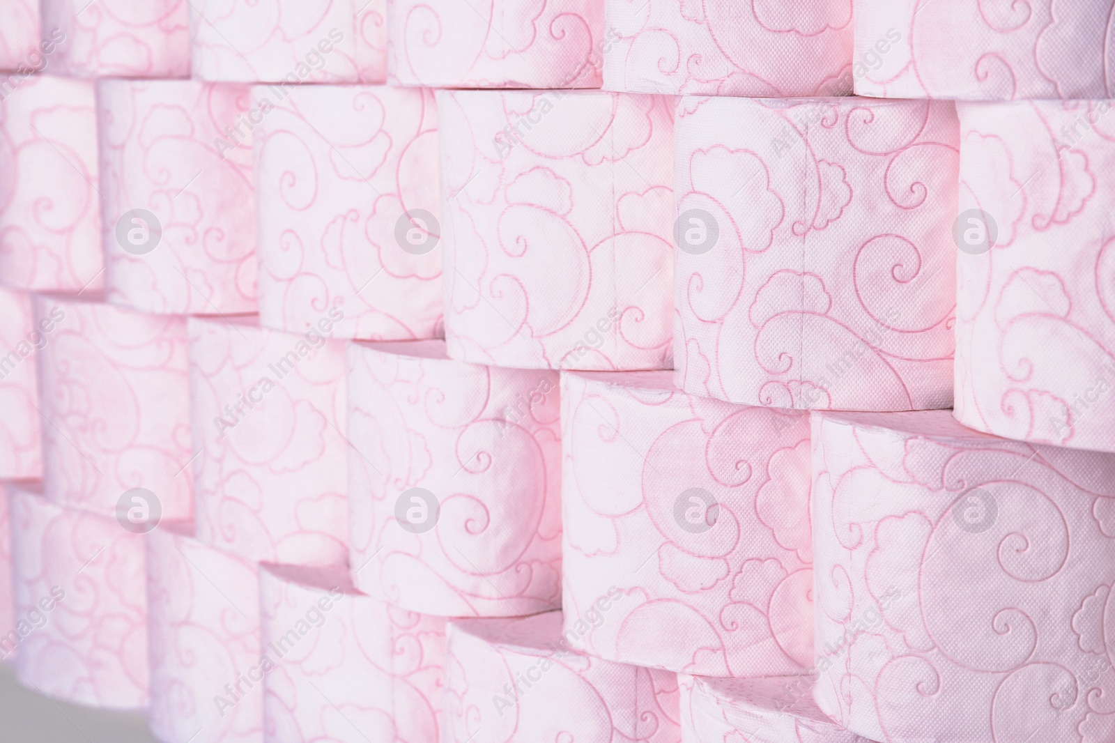 Photo of Many rolls of toilet paper as background. Personal hygiene