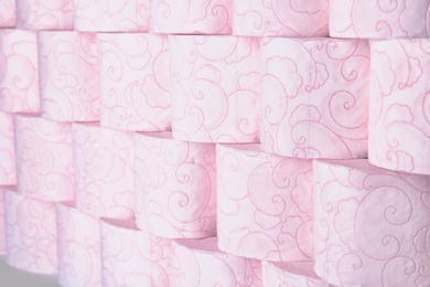 Photo of Many rolls of toilet paper as background. Personal hygiene