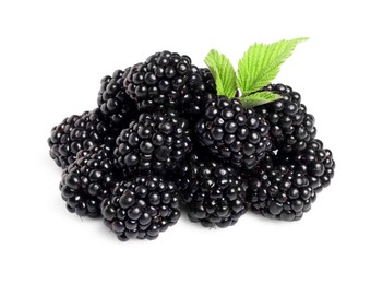 Photo of Pile of ripe blackberries with green leaves isolated on white