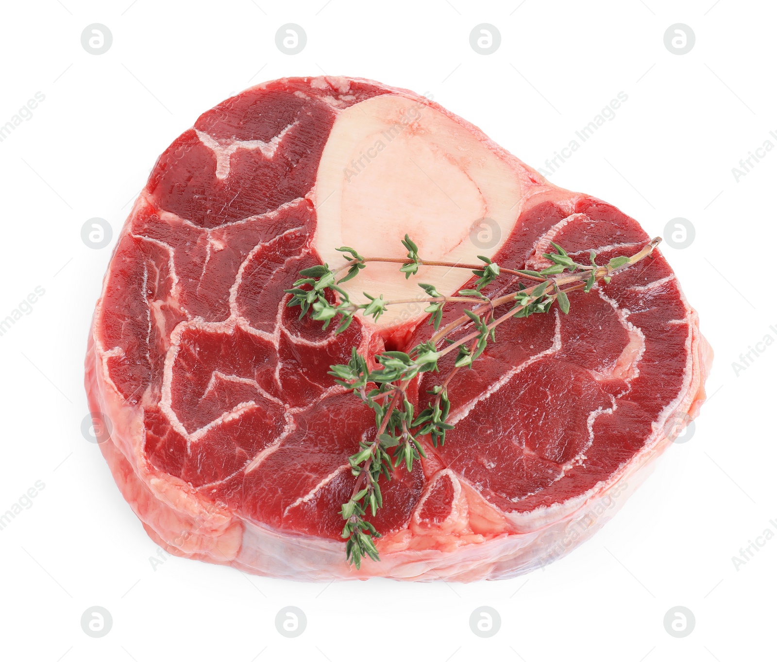 Photo of Piece of raw beef meat and thyme isolated on white