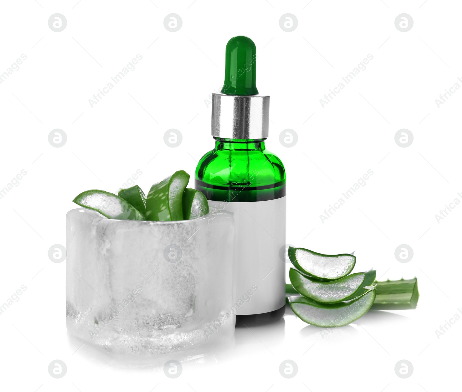 Photo of Bottle of essential oil and ice container with sliced aloe vera plant on white background