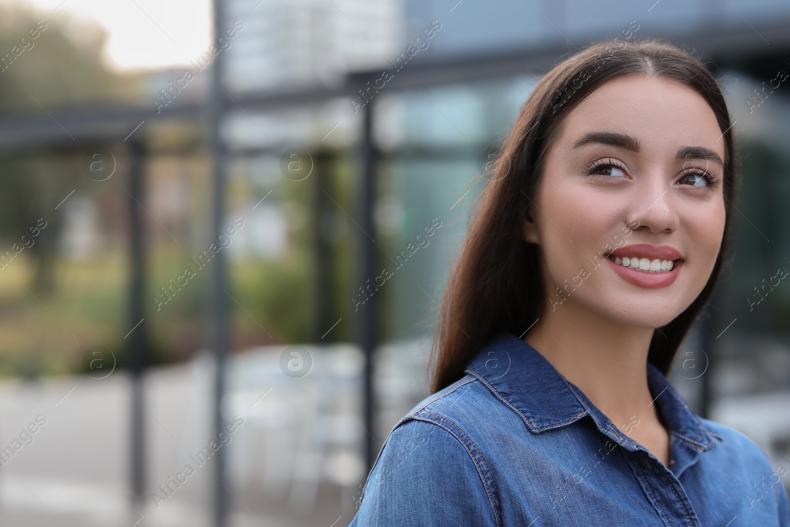 Photo of Portrait of beautiful woman outdoors. Attractive lady smiling outdoors. Space for text