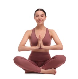 Photo of Beautiful young woman practicing yoga on white background. Lotus pose