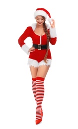 Beautiful Santa girl on white background. Christmas eve