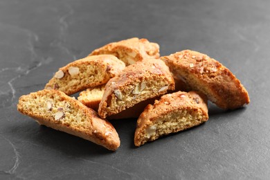 Photo of Traditional Italian almond biscuits (Cantucci) on grey table