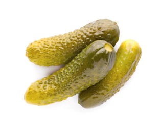 Photo of Tasty crunchy pickled cucumbers on white background, top view