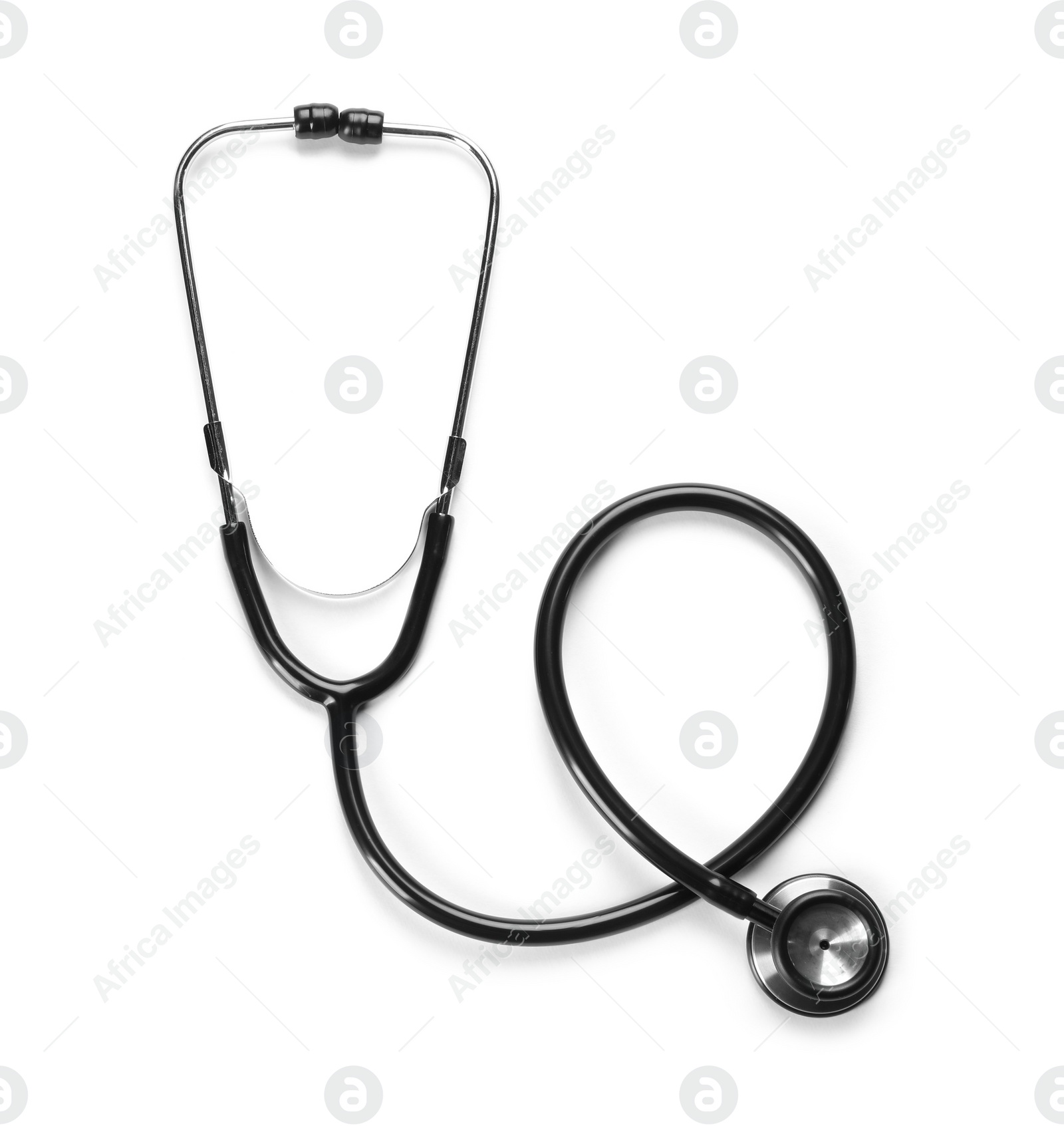 Photo of New stethoscope on white background, top view. Medical instrument