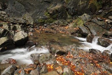 Beautiful view of mountain stream and rocks outdoors