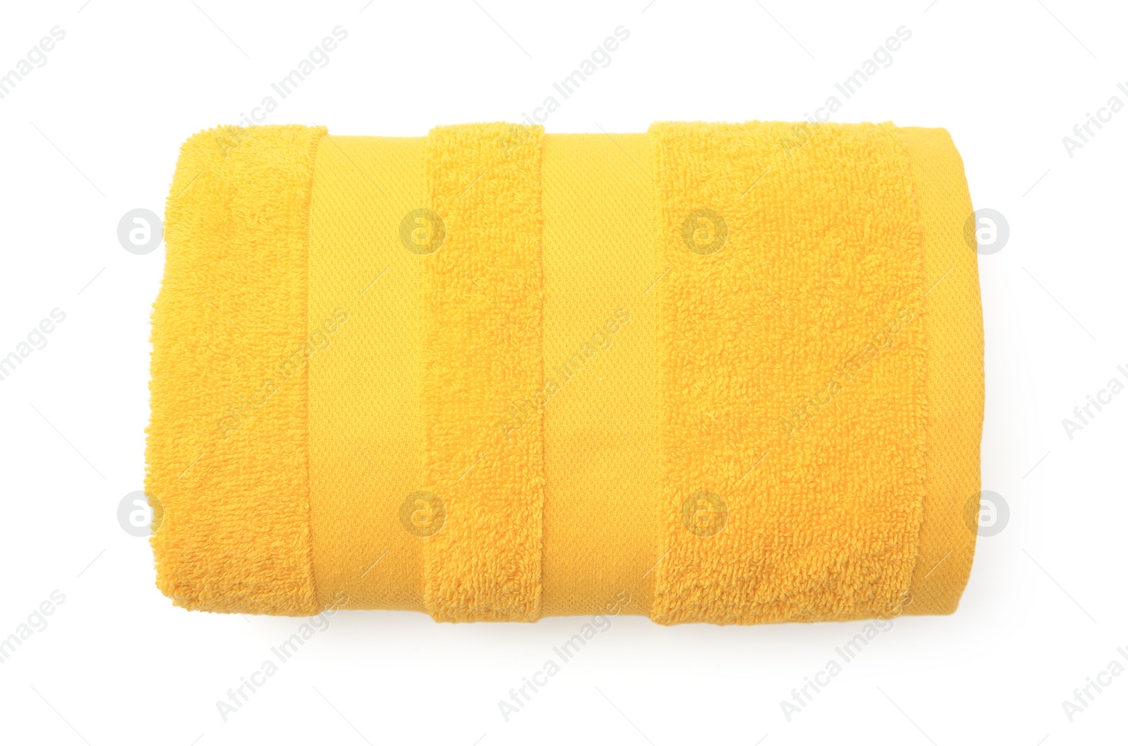 Photo of Rolled yellow terry towel isolated on white, top view
