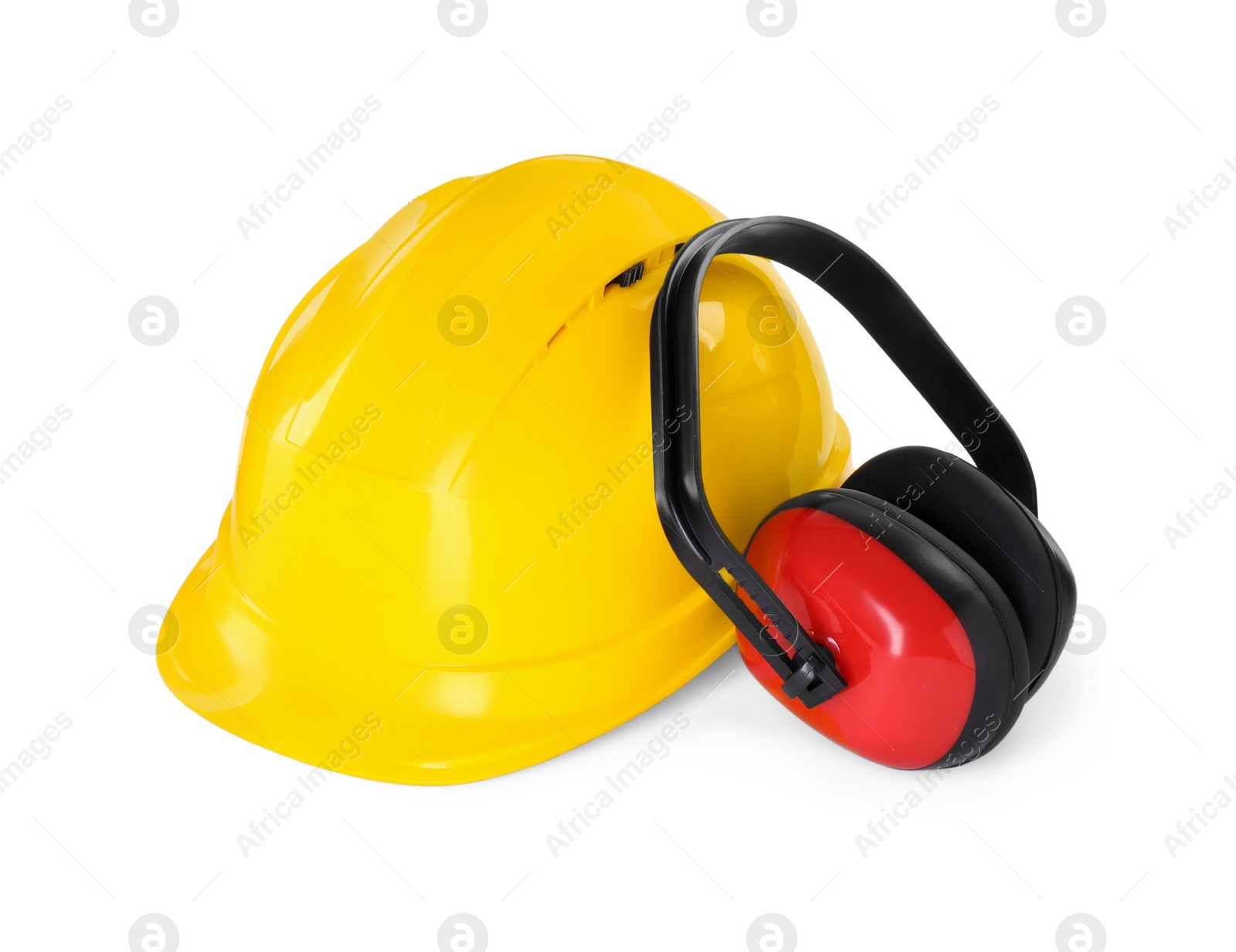 Photo of Hard hat and earmuffs isolated on white. Safety equipment