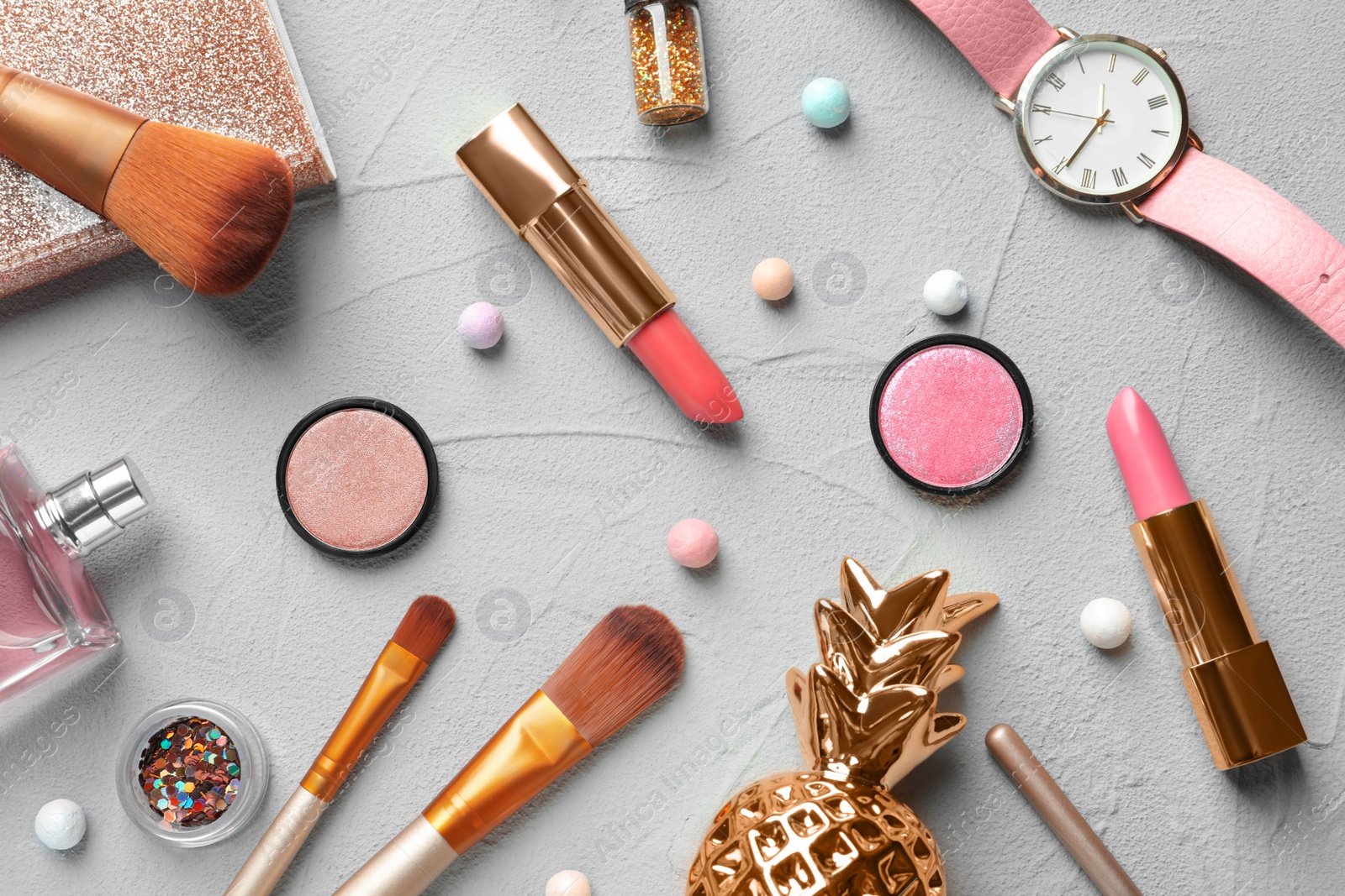 Photo of Flat lay composition with decorative cosmetics on gray background