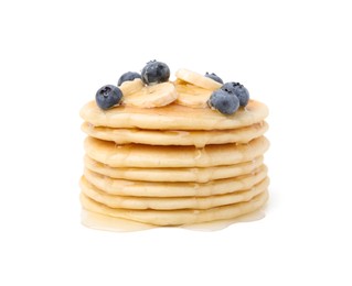 Delicious pancakes with banana slices, blueberries and honey isolated on white