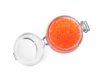 Photo of Open jar with delicious red caviar isolated on white, top view