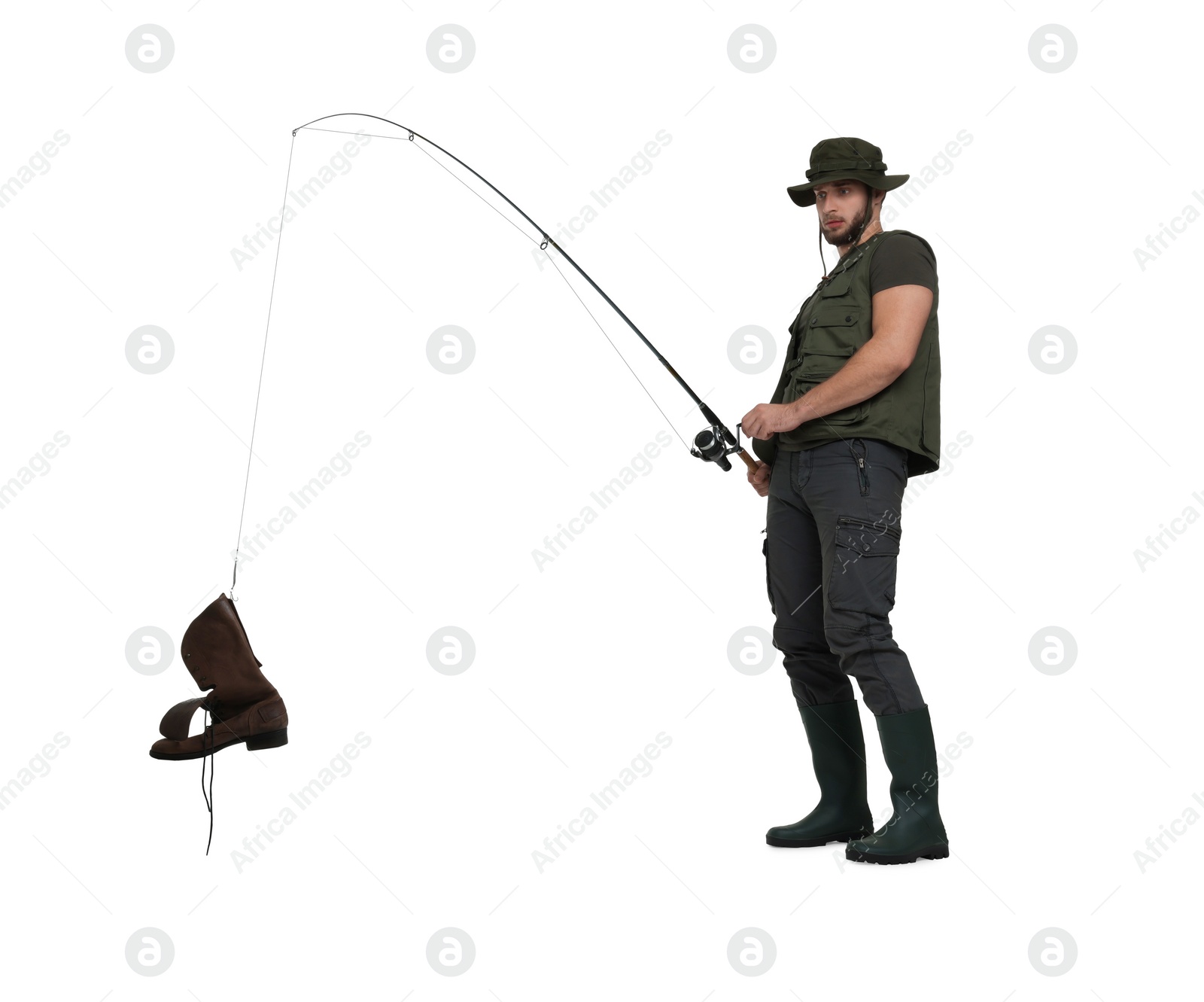 Photo of Confused fisherman with rod and old boot isolated on white