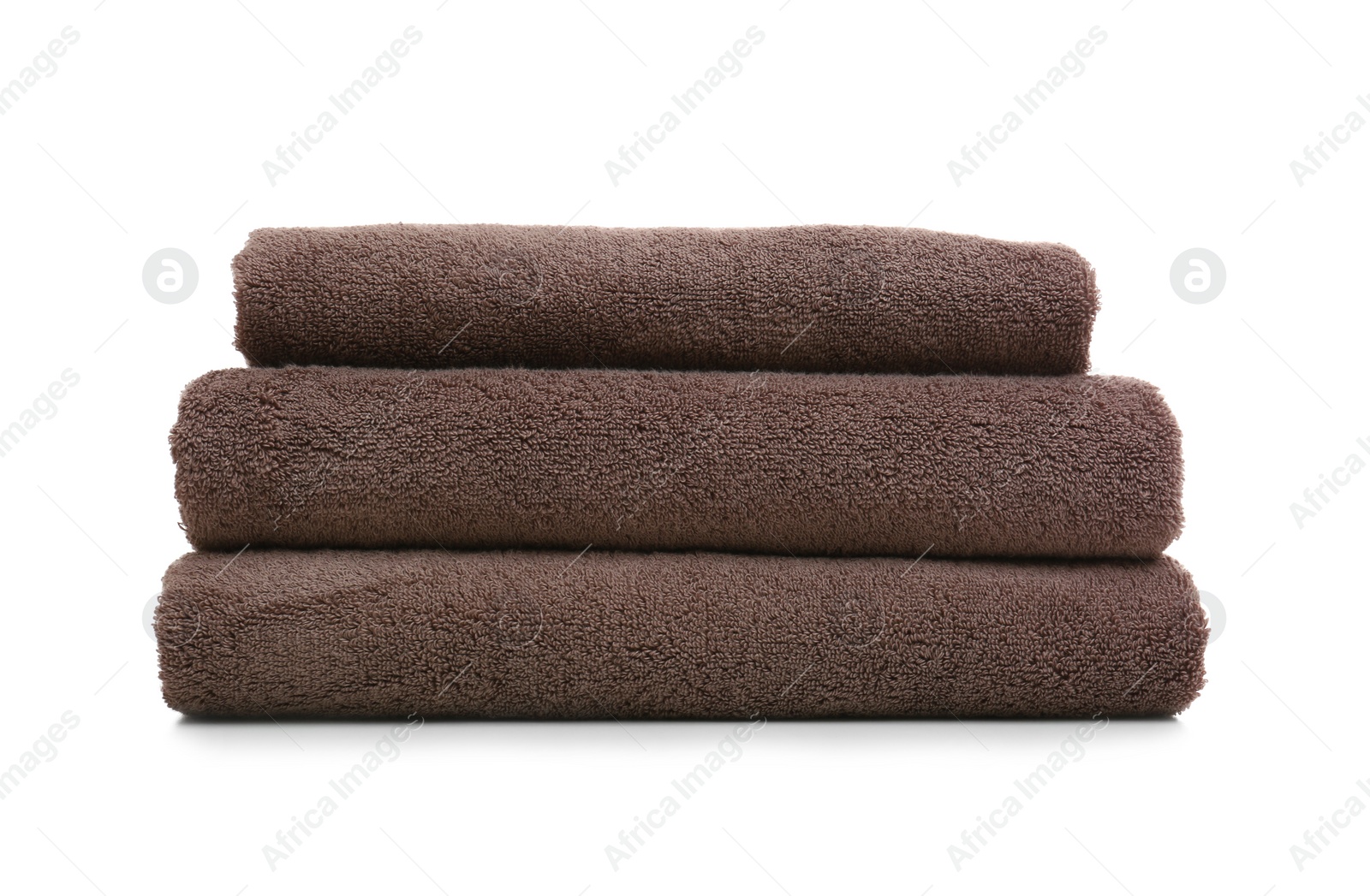 Photo of Stack of clean folded towels on white background