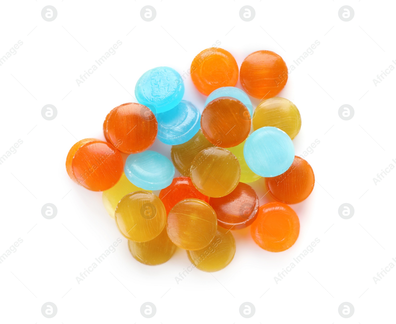 Photo of Many different color cough drops on white background, top view