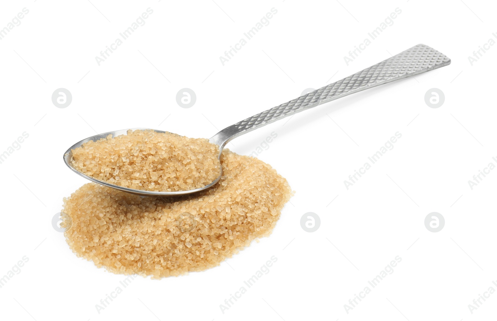 Photo of Pile of brown sugar and spoon isolated on white