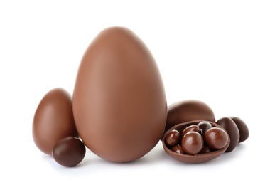 Photo of Tasty chocolate Easter eggs on white background