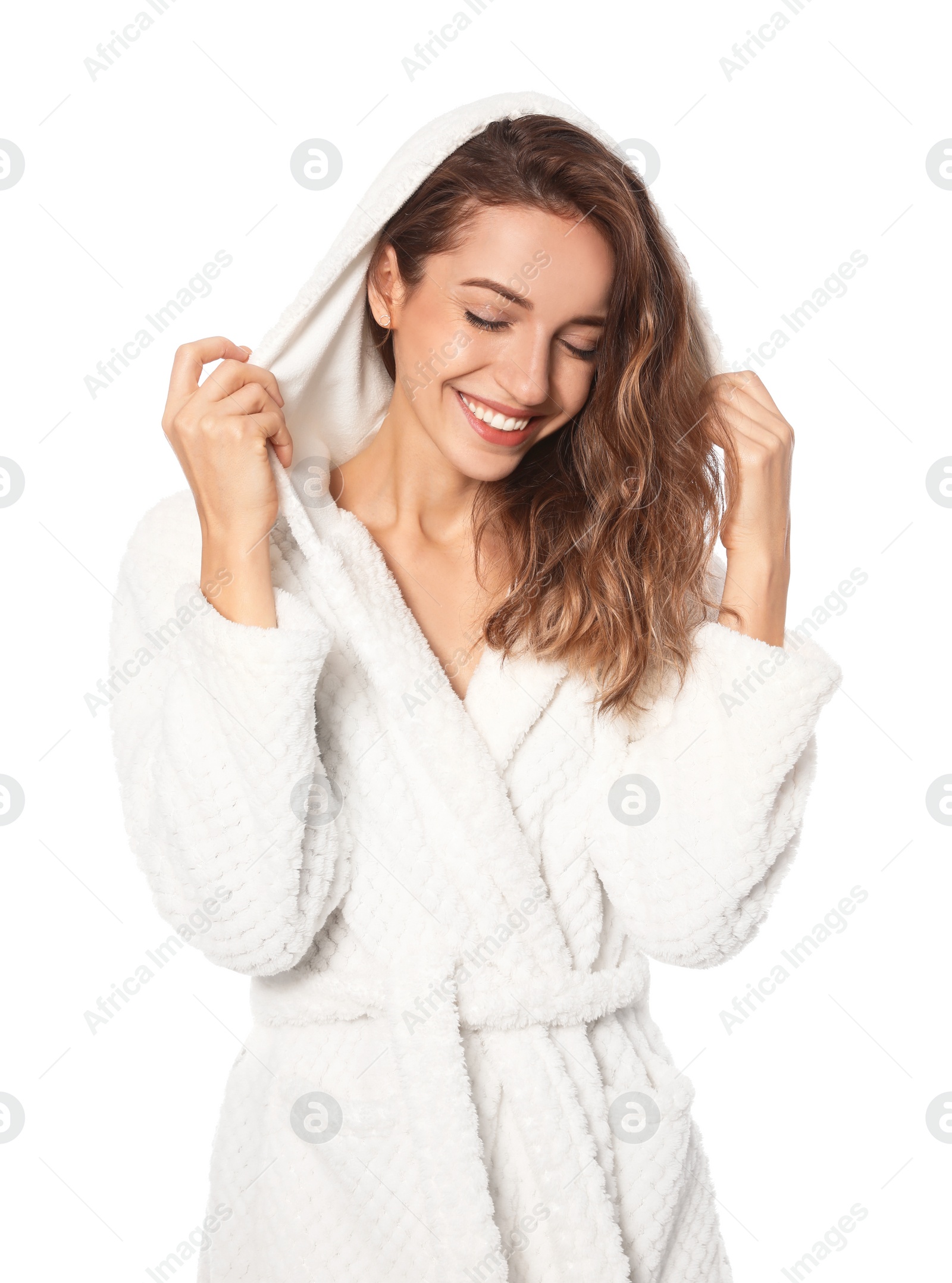 Photo of Beautiful young woman wearing bathrobe on white background