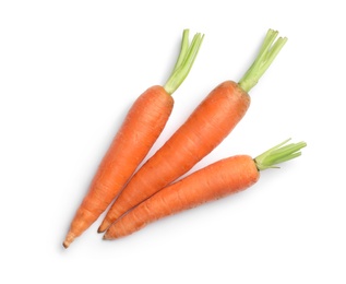 Photo of Fresh ripe carrots on white background, top view